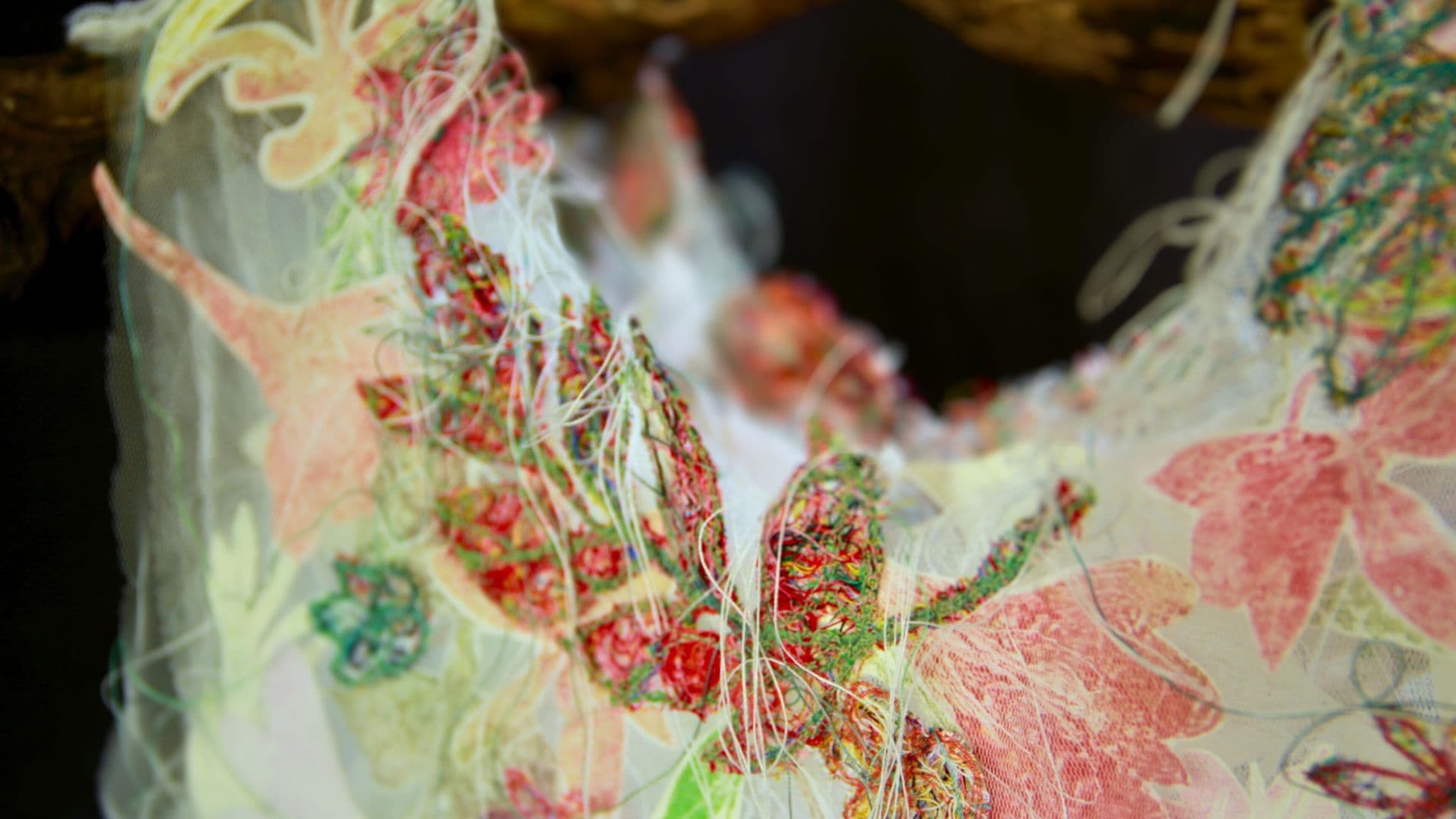 A close up of a piece of an embroidered fabric